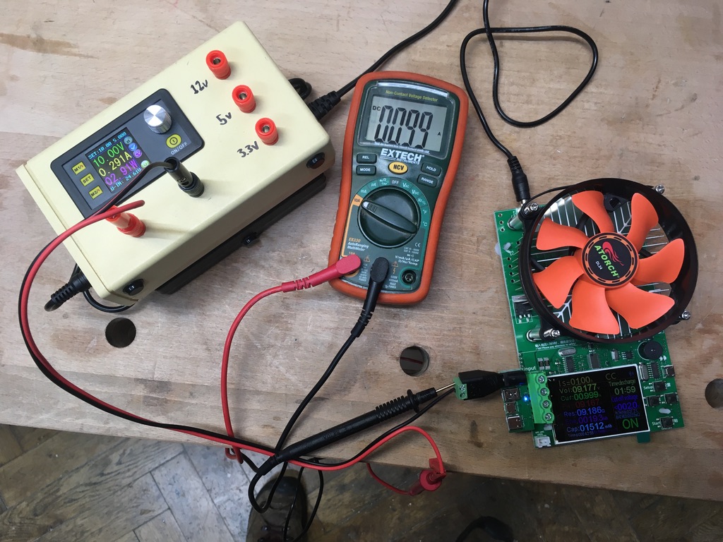 In the test setup, the DP30V5A is set to source 10V at a maximum of 5A. It’s connected (via a multimeter in 10A current measurement mode) to an electronic load set to consume 1A. Both the multimeter and load report a current consumption of 1A, but the DP30V5A reports only 0.29A.